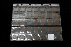 A group of assorted pennies and half pennies - 5