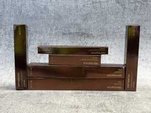 Group of Hourglass makeup brushes