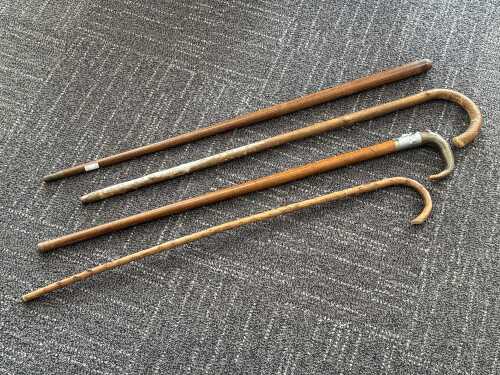 15 · Four timber walking canes