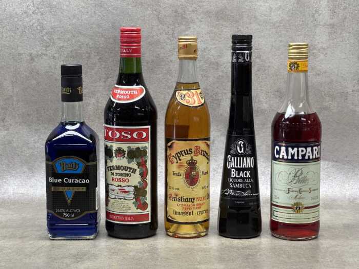 Five bottles of alcoholic mixers