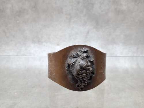 59 · Victorian bronze tone vulcanite bangle