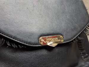 Designer-style black handbag with gold tone hardware and bag scarfe - 2