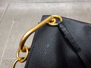 Designer-style handbag in black with gold tone hardware and red and blue belt - 3