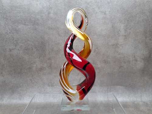 Art glass twist form sculpture in clear, yellow and red