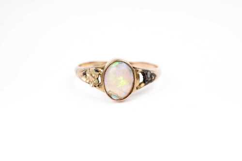 An antique triplet opal brooch in 15 carat gold