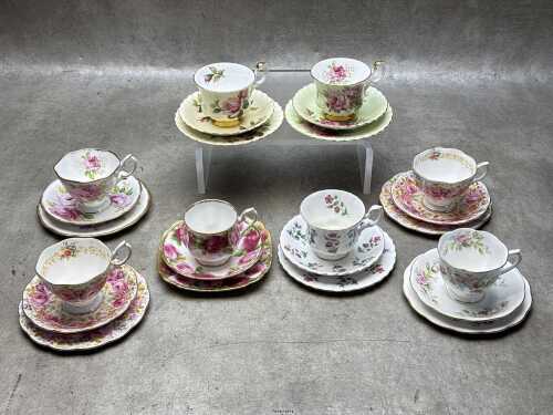 Eight Royal Albert porcelain trios