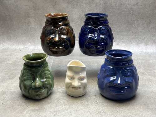 Five ceramic character jugs, two signed by John Campbell