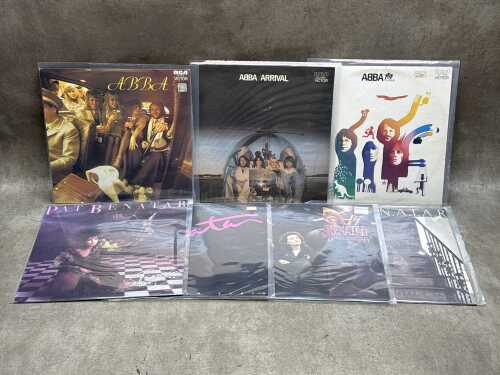 Eight ABBA and Pat Benatar vinyl records