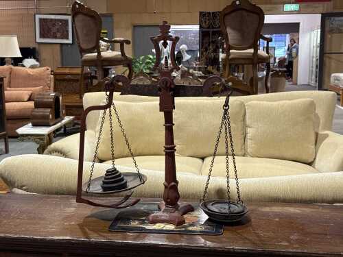 Antique cast iron balance scales with weights
