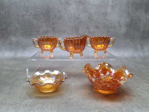 Five pieces of carnival glass
