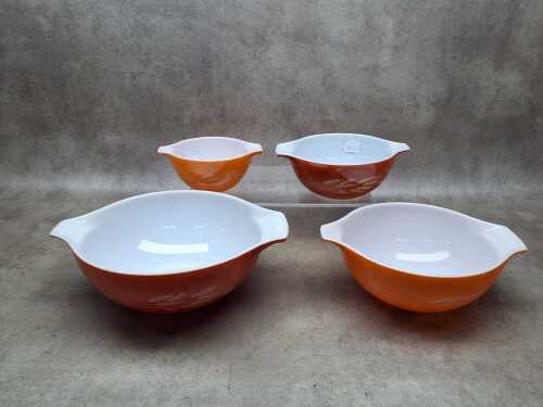 Four Pyrex Autumn Harvest Wheat mixing bowls.