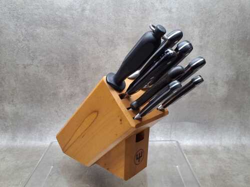 Assorted knives including Wusthof in a block