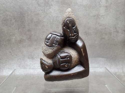 Shona stone sculpture featuring three faces