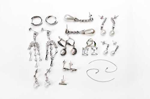 A collection of earrings in sterling silver