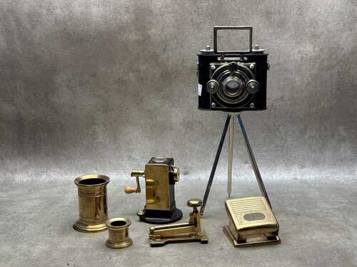 Decorative items including brass desk set and decorative camera