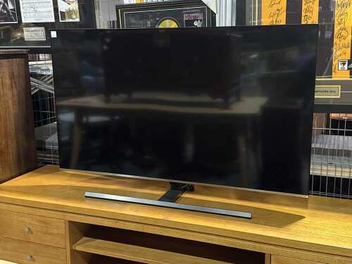 Samsung 55'' Smart TV on stand