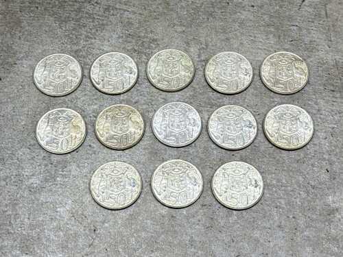 Thirteen1966 Australian 50c pieces