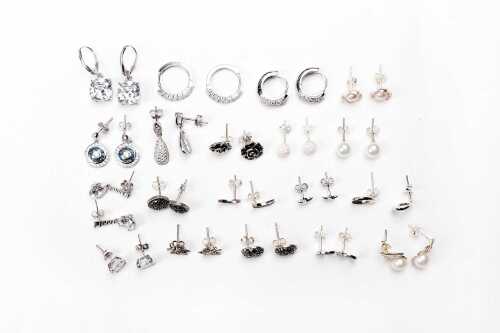 A collection of earrings in sterling silver