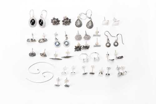 A collection of earrings in sterling silver