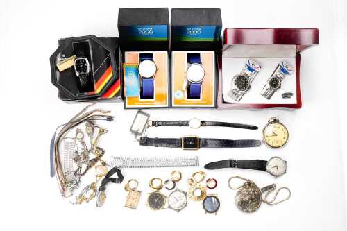 A large collection of vintage watches and parts