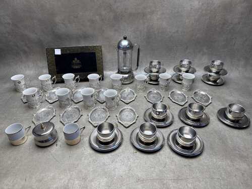 Group of demitasse and Glasnost Italian espresso maker