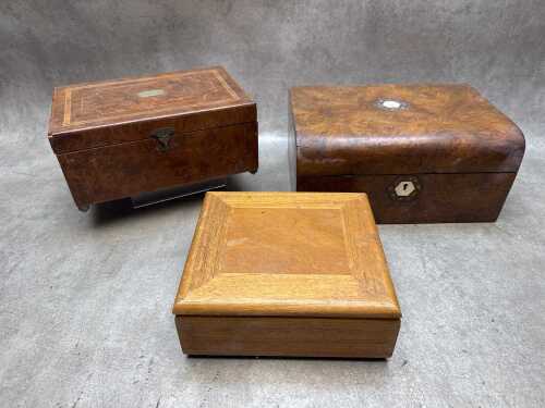 Three vintage timber boxes, one musical