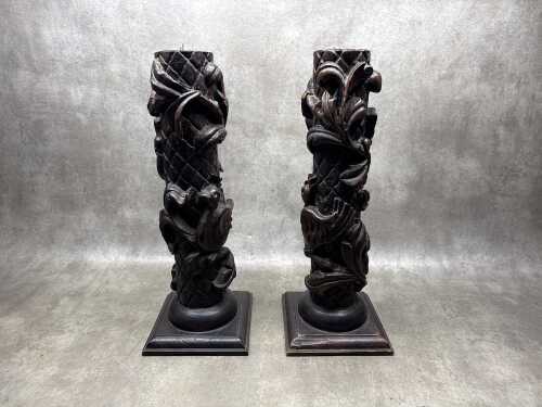 Hand-carved timber candlesticks featuring bird motifs