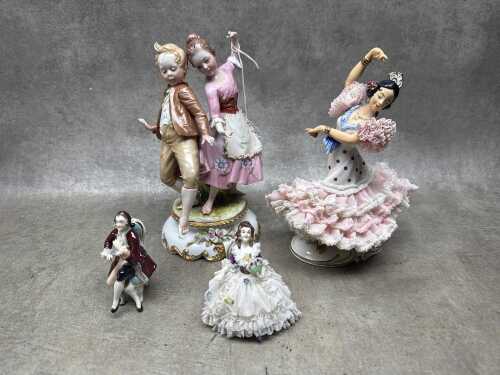 Four European porcelain figures