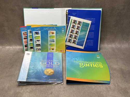 Two Australian Gold Medalist stamp albums