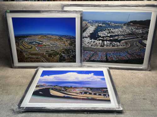 Three framed racing photos