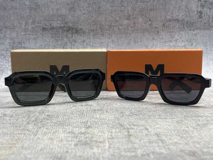 Two pairs of Meller sunglasses