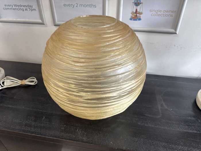 Translucent and furrowed glass-look resin orb vase