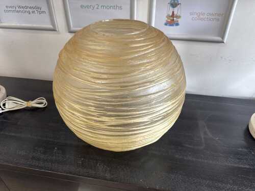 Translucent and furrowed glass-look resin orb vase