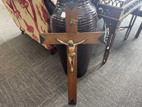 Decorative timber crucifix featuring a copper corpus.