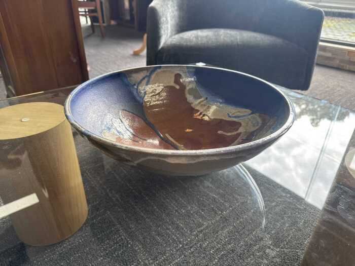 Studio pottery centerpiece bowl in brown and blue tones