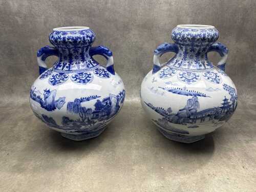 Pair of blue and white porcelain twin-handled gourd vases