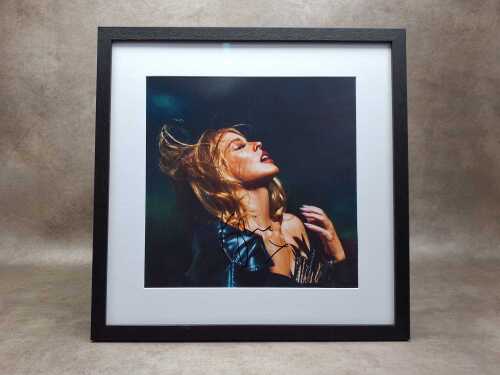 Kylie Minogue framed and signed art card.