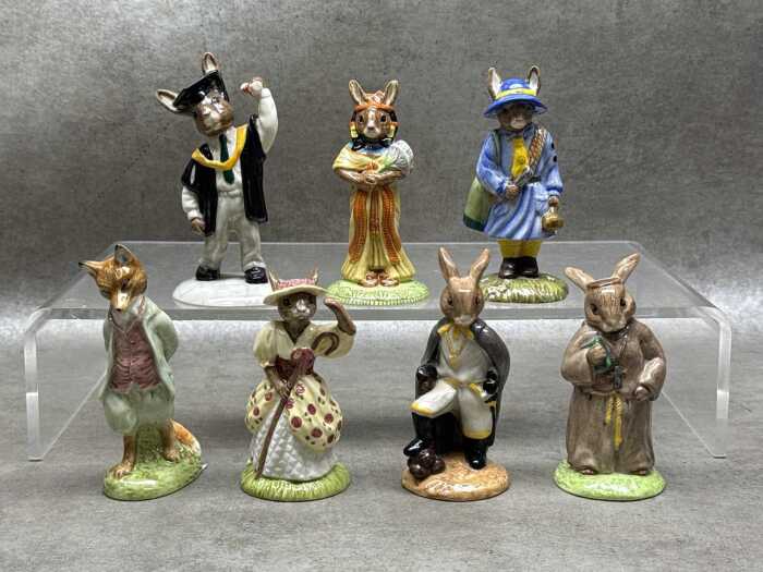 Six Royal Doulton porcelain Bunnykins and one Royal Doulton figure.