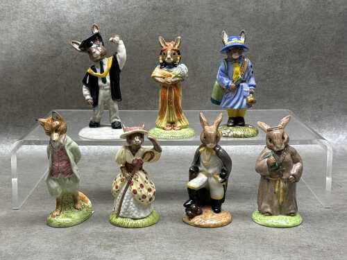Six Royal Doulton porcelain Bunnykins and one Royal Doulton figure.