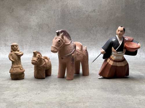 Four Asian terracotta figures