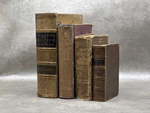 Four antique medical and science books
