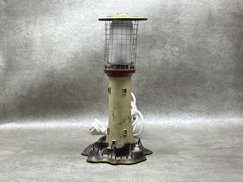 Vintage cast metal lighthouse table lamp