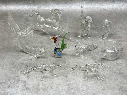 Nine art glass animal figures, mostly clear