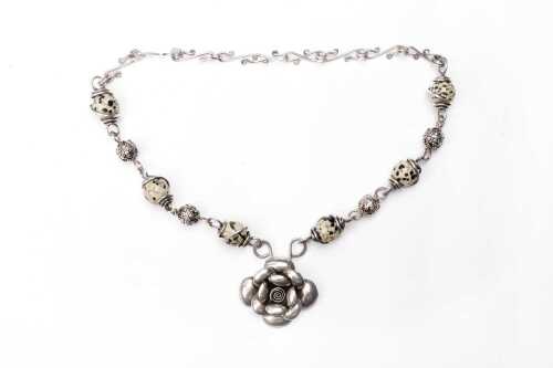 A dalmatian jasper necklace in sterling silver.