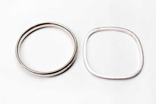 Two bangles in sterling silver.