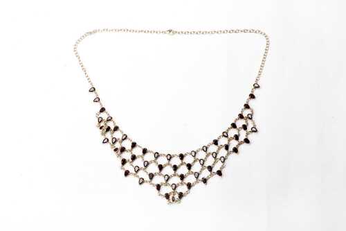 A garnet necklace in gold plated sterling silver