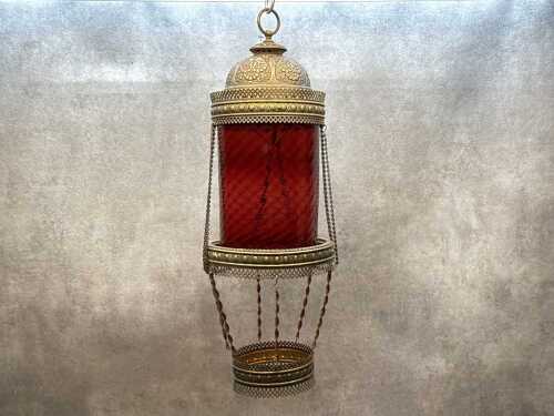 Moroccan-style decorative brass and red glass hanging light