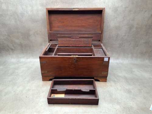 Timber trunk with brass bindings