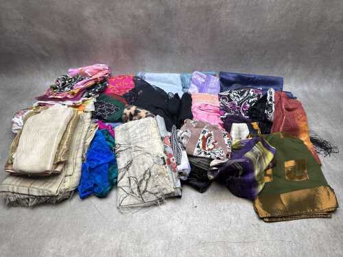 Collection of scarves in various colours and fabrics