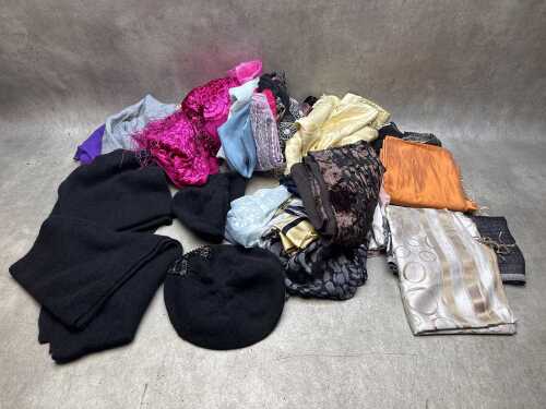 Collection of scarves in various colours and fabrics
